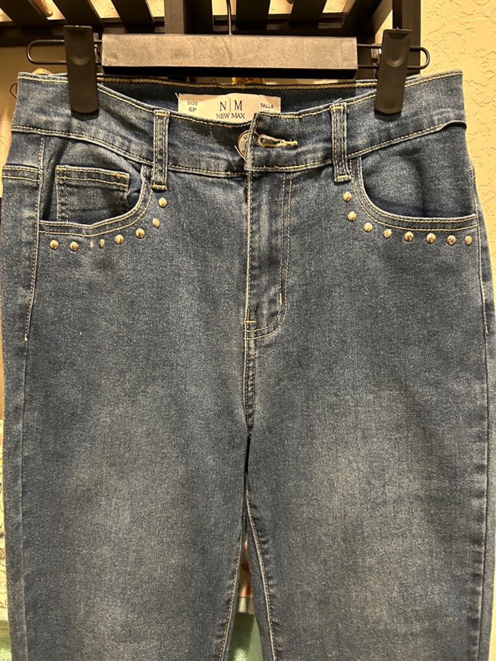 High-Rise Blue Jeans with Gold Stud Accents